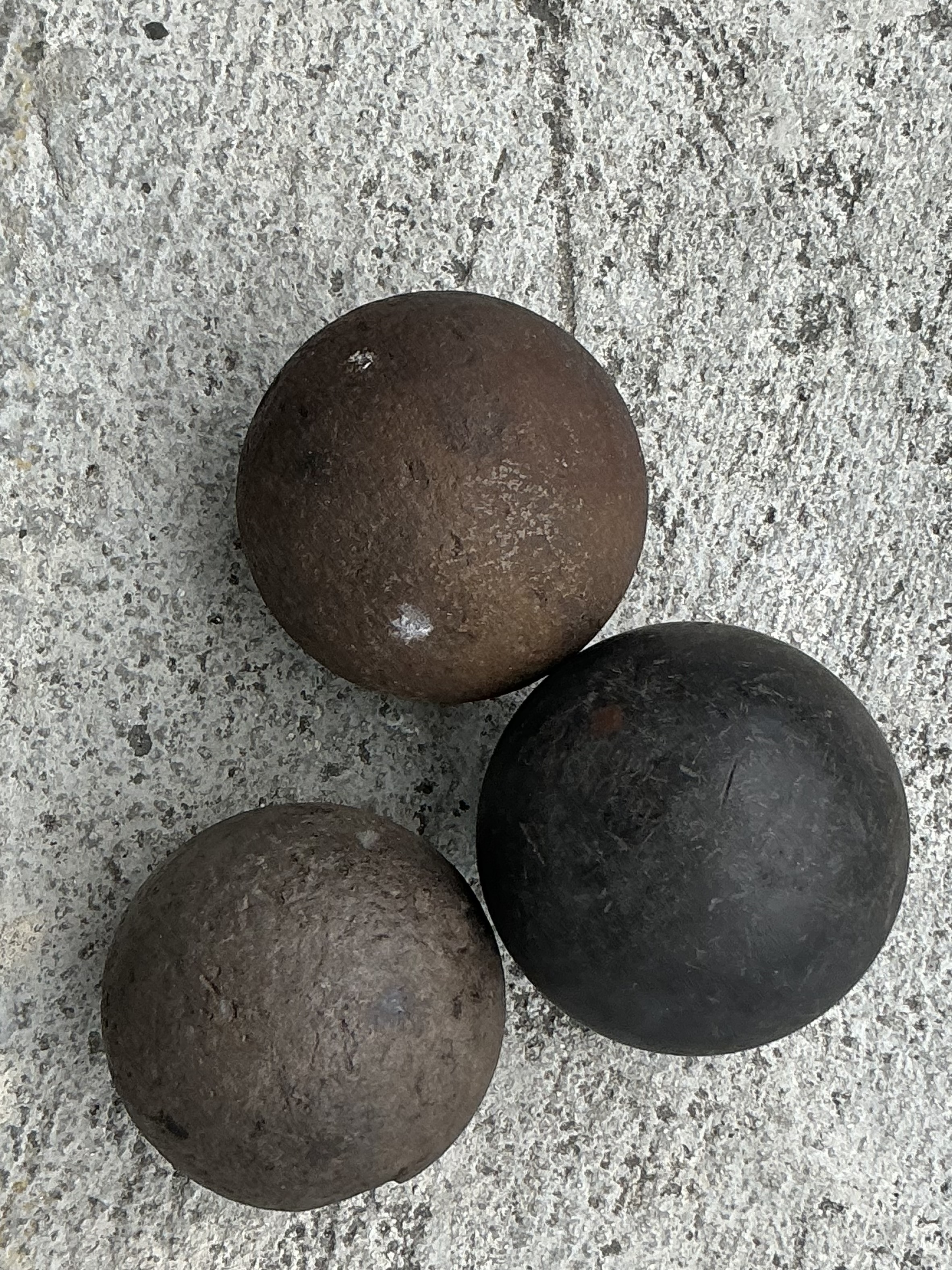 Vintage Boho Solid Iron Cannonballs - Set Of Three  - Side view