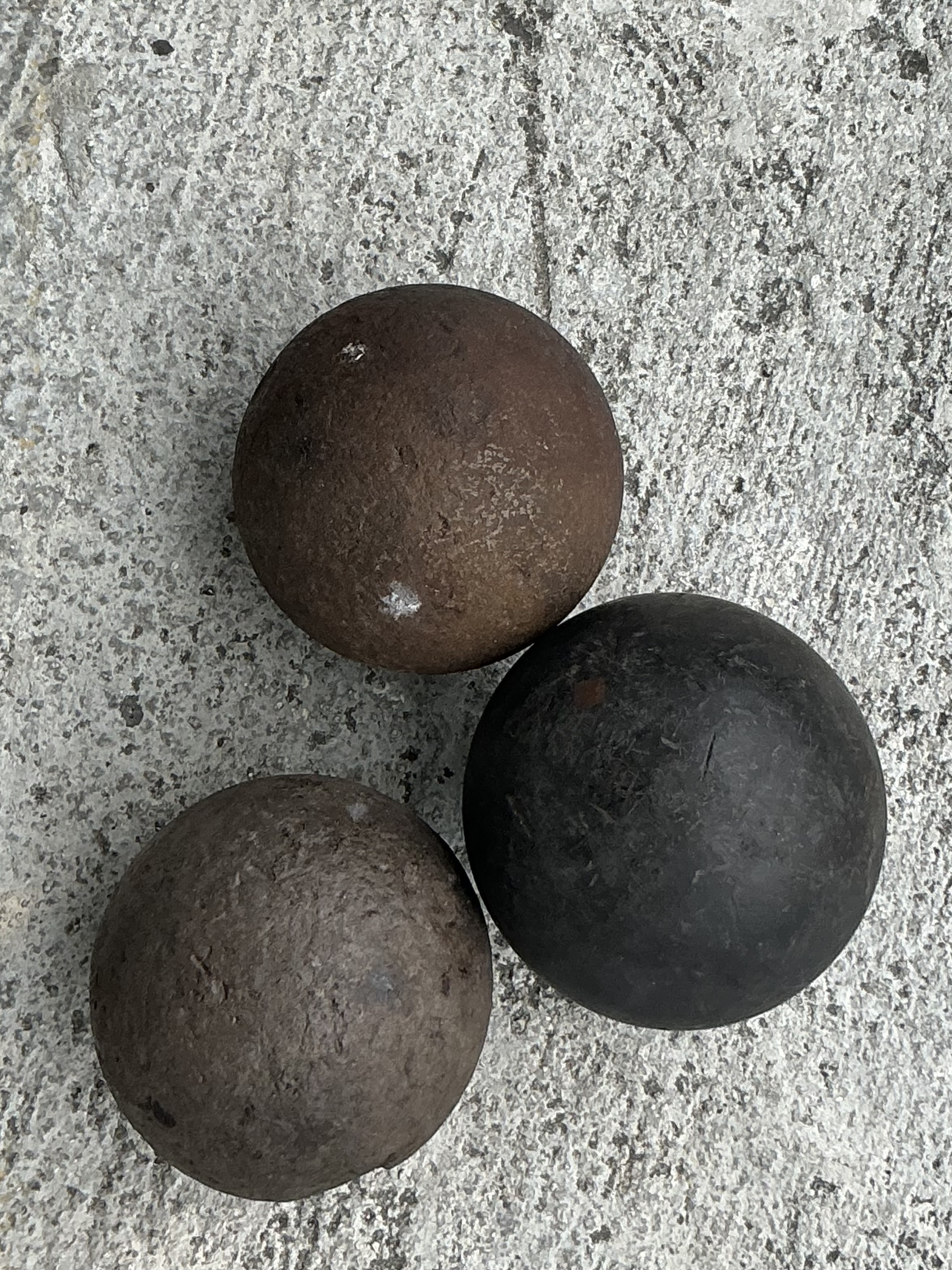 Vintage Boho Solid Iron Cannonballs - Set Of Three - Top view