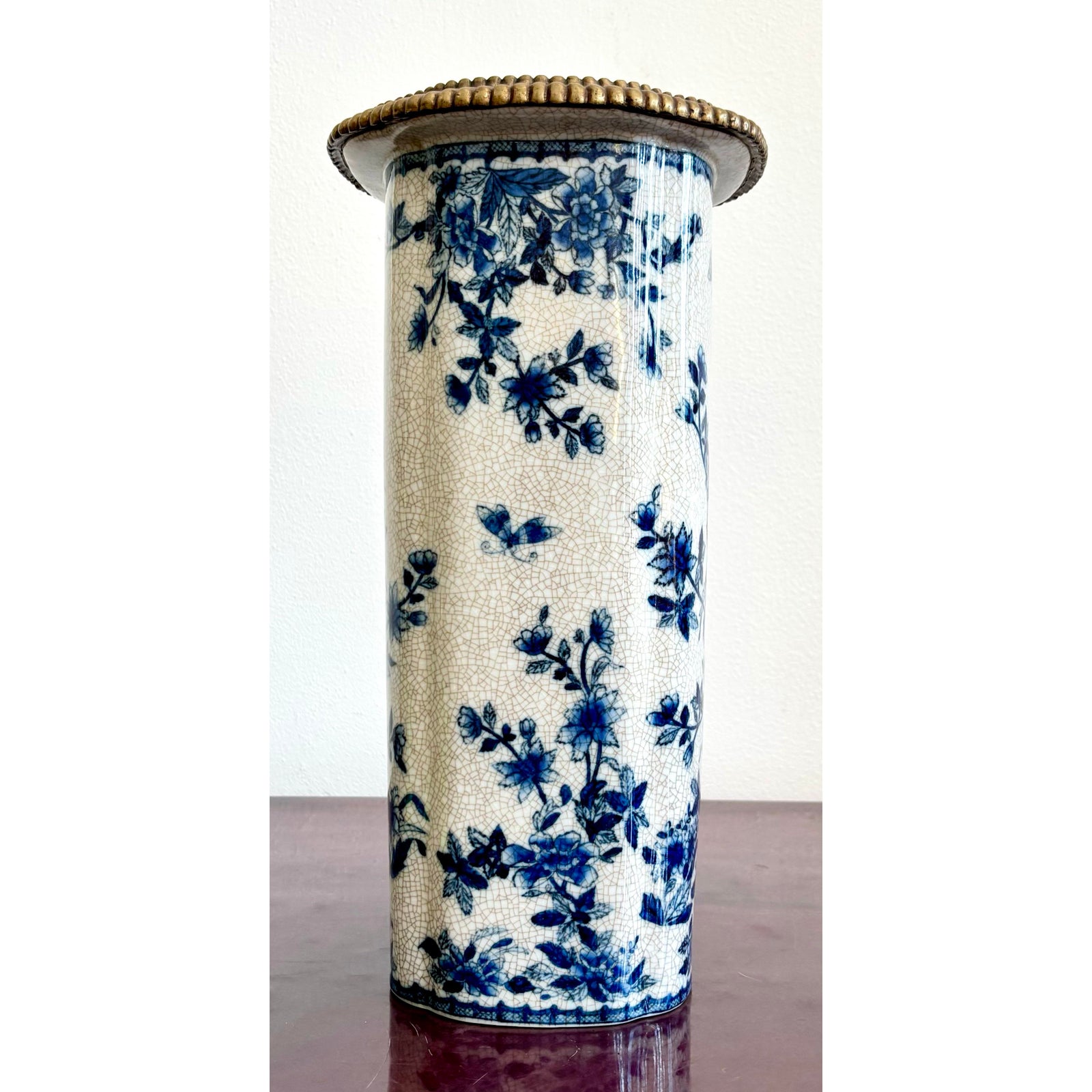 Vintage Hand Painted Blue and White Vase With Burnished Brass Detailing - Detail view