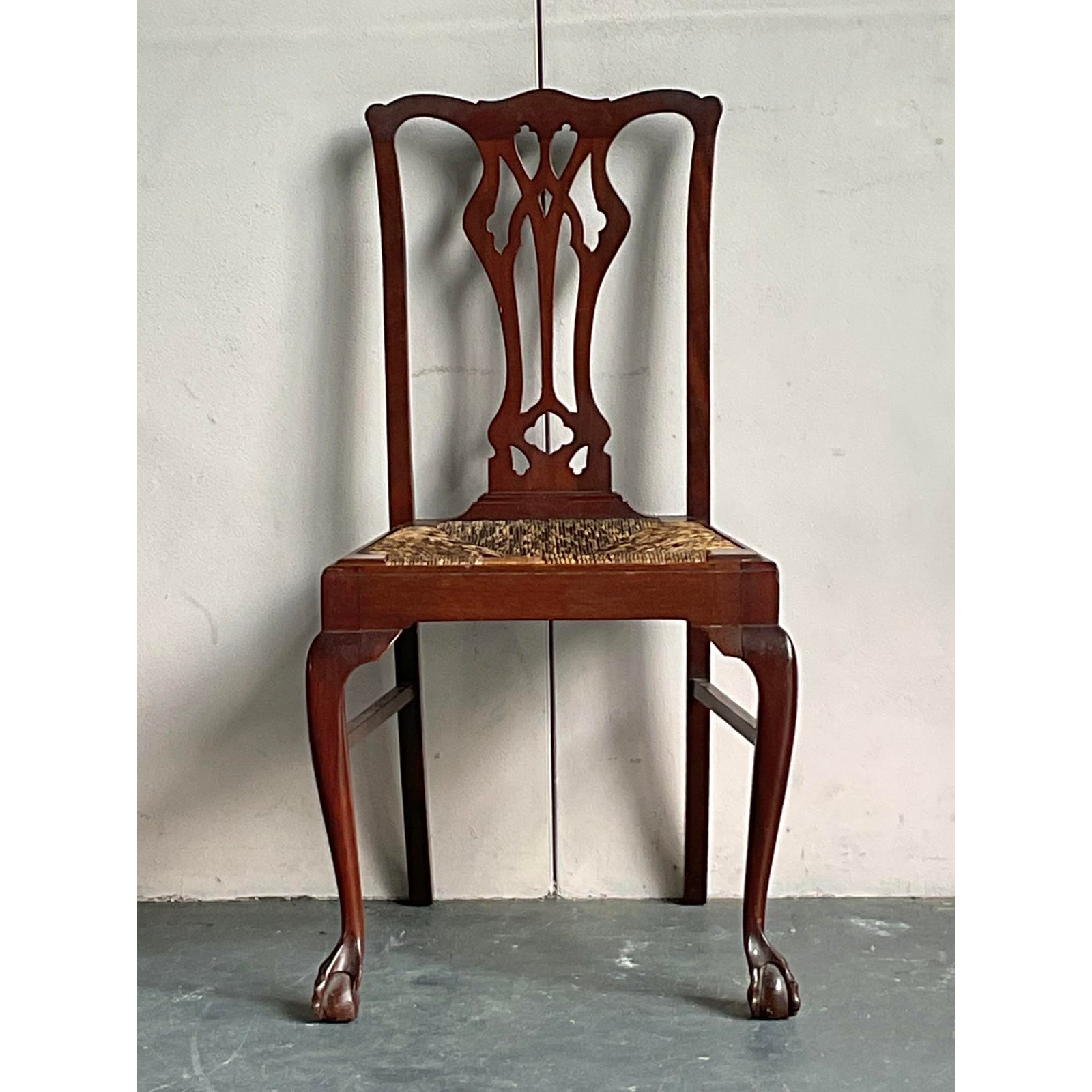Step back in time with this elegant vintage side chair, a distinguished piece that captures the refined essence of Regency...Traditional Vintage Regency Claw and Ball Rush Seat Side Chair For Sale - Image 3 of 6Vintage Regency Claw and Ball Rush Seat Side Chair For Sale - Image 4 of 6Mid 20th Century Vintage Regency Claw and Ball Rush Seat Side Chair For Sale - Image 5 of 6Vintage Regency Claw and Ball Rush Seat Side Chair For Sale In West Palm - Image 6 of 6 Or save it to favorites and we'll tell you if this item goes on sale!  Vintage Regency Claw and Ball Rush Seat Side Chair For SaleStep back in time with this elegant vintage side chair, a distinguished piece that captures the refined essence of Regency...Traditional Vintage Regency Claw and Ball Rush Seat Side Chair For Sale - Image 3 of 6Vintage Regency Claw and Ball Rush Seat Side Chair For Sale - Image 4 of 6Mid 20th Century Vintage Regency Claw and Ball Rush Seat Side Chair For Sale - Image 5 of 6Vintage Regency Claw and Ball Rush Seat Side Chair For Sale In West Palm - Image 6 of 6Vintage Regency Claw and Ball Rush Seat Side Chair For Sale Vintage Regency Claw and Ball Rush Seat Side Chair - Back view