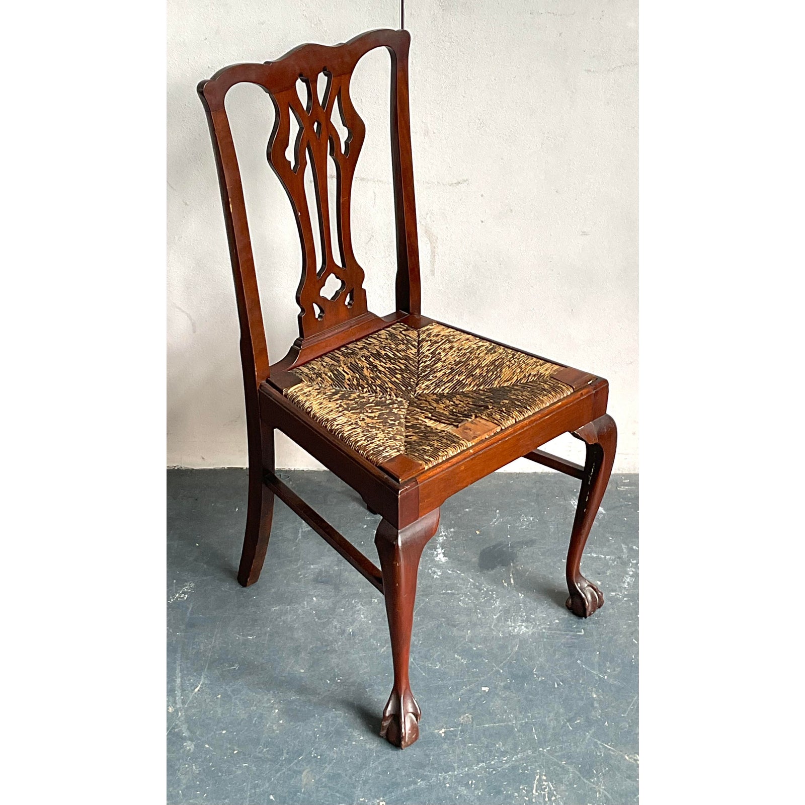 Step back in time with this elegant vintage side chair, a distinguished piece that captures the refined essence of Regency...Traditional Vintage Regency Claw and Ball Rush Seat Side Chair For Sale - Image 3 of 6Vintage Regency Claw and Ball Rush Seat Side Chair For Sale - Image 4 of 6Mid 20th Century Vintage Regency Claw and Ball Rush Seat Side Chair For Sale - Image 5 of 6Vintage Regency Claw and Ball Rush Seat Side Chair For Sale In West Palm - Image 6 of 6 Or save it to favorites and we'll tell you if this item goes on sale!  Vintage Regency Claw and Ball Rush Seat Side Chair For SaleStep back in time with this elegant vintage side chair, a distinguished piece that captures the refined essence of Regency...Traditional Vintage Regency Claw and Ball Rush Seat Side Chair For Sale - Image 3 of 6Vintage Regency Claw and Ball Rush Seat Side Chair For Sale - Image 4 of 6Mid 20th Century Vintage Regency Claw and Ball Rush Seat Side Chair For Sale - Image 5 of 6Vintage Regency Claw and Ball Rush Seat Side Chair For Sale In West Palm - Image 6 of 6Vintage Regency Claw and Ball Rush Seat Side Chair For Sale Vintage Regency Claw and Ball Rush Seat Side Chair - Detail view