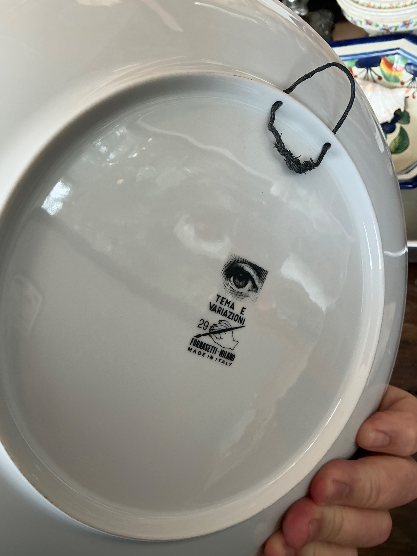 Fornasetti Italian Gold Striped Tema e Variazioni Plate - Side view