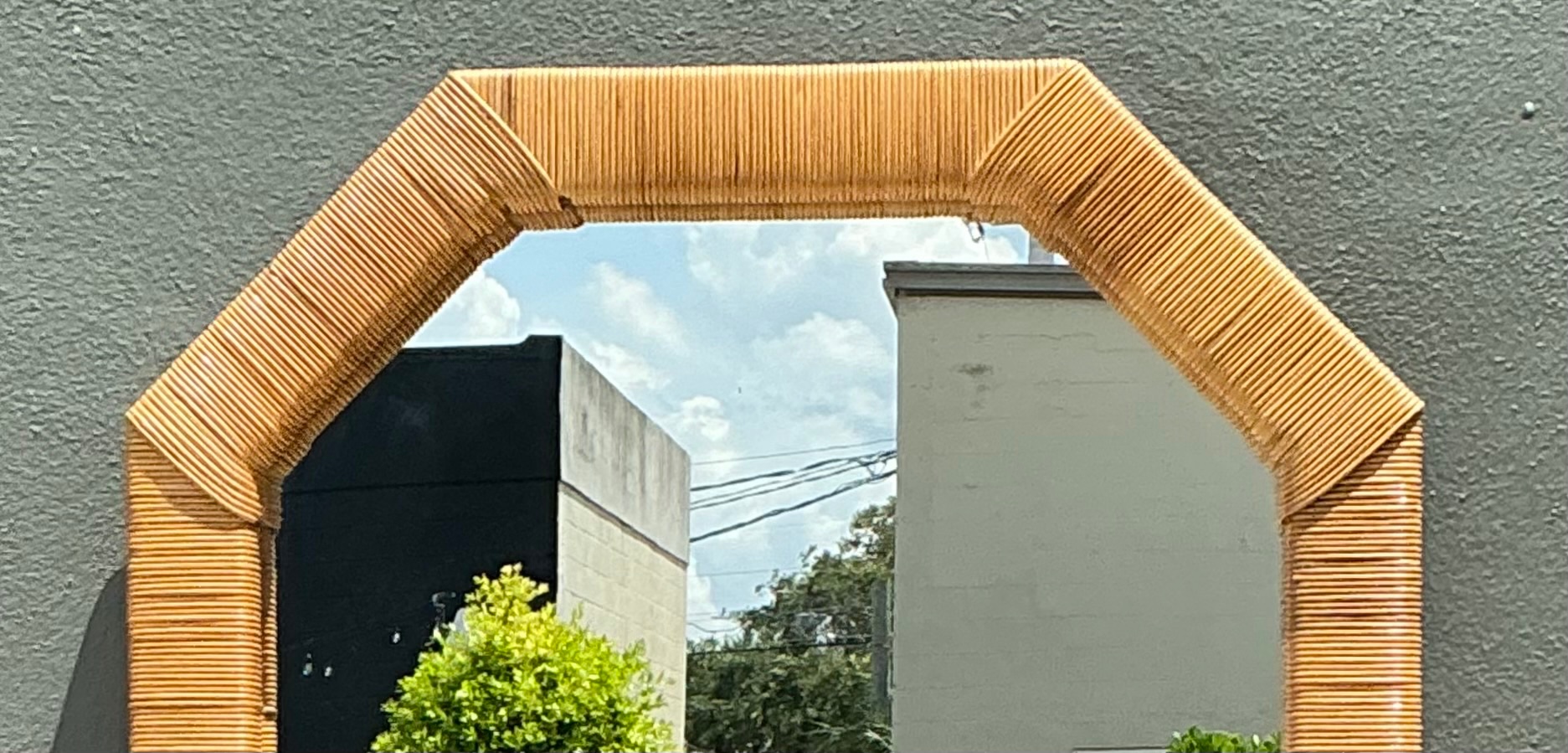 Vintage Octagonal Rattan Wrapped Wall Mirror - Side view