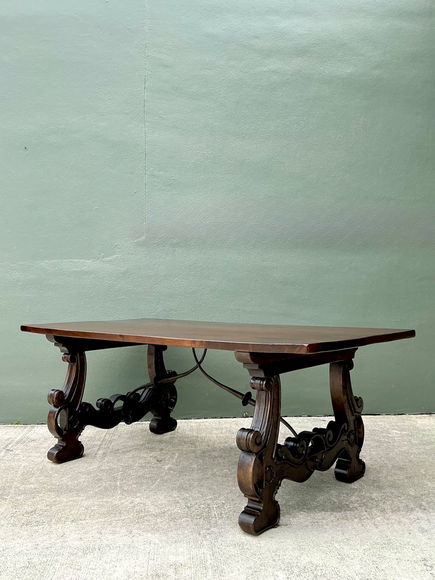 Vintage Spanish Revival Carved Wood Trestle Table - Side view