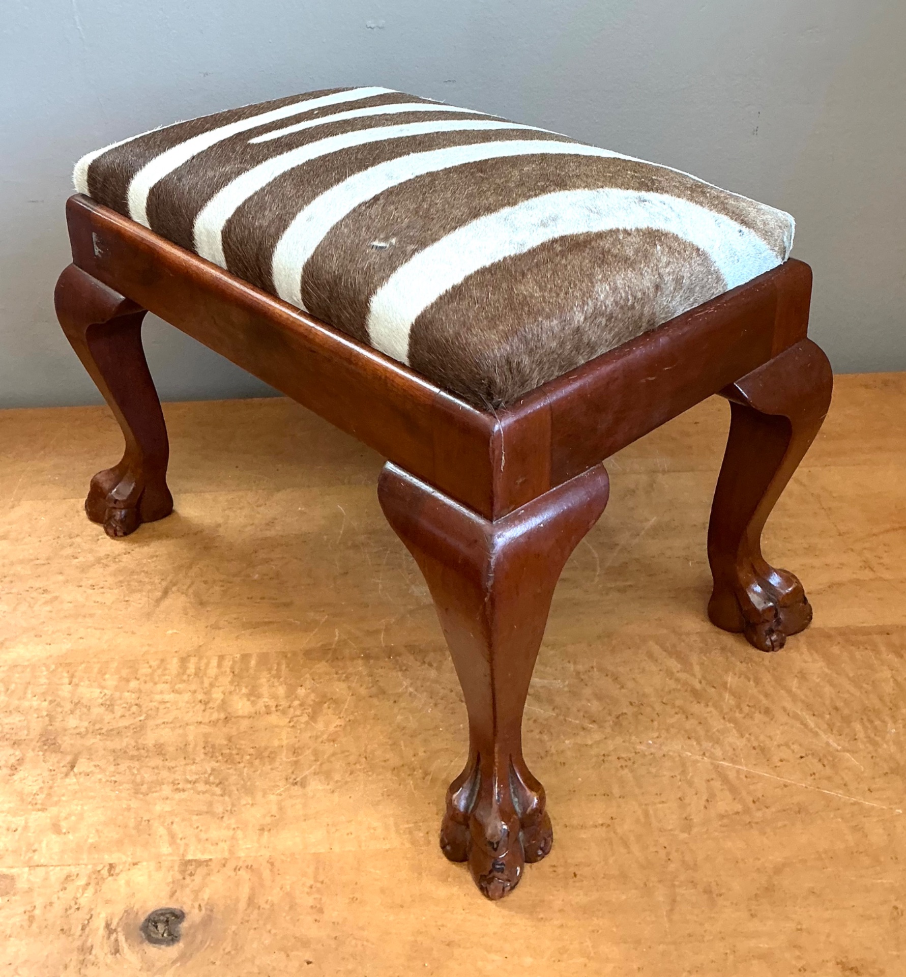 Vintage Zebra Upholstered Claw Foot Stool - Side view