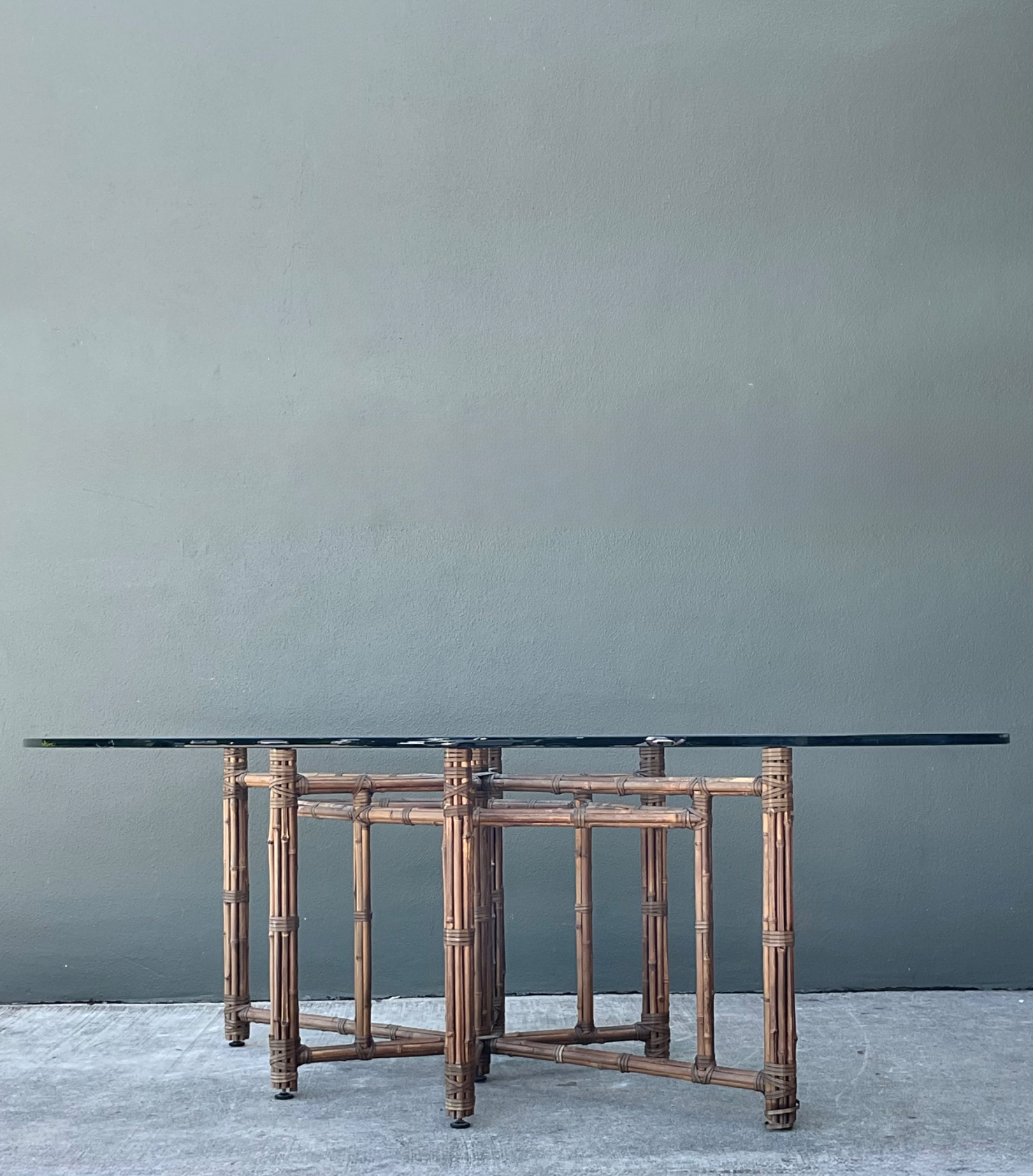 McGuire Rattan and Glass Oval Dining Table - Side view