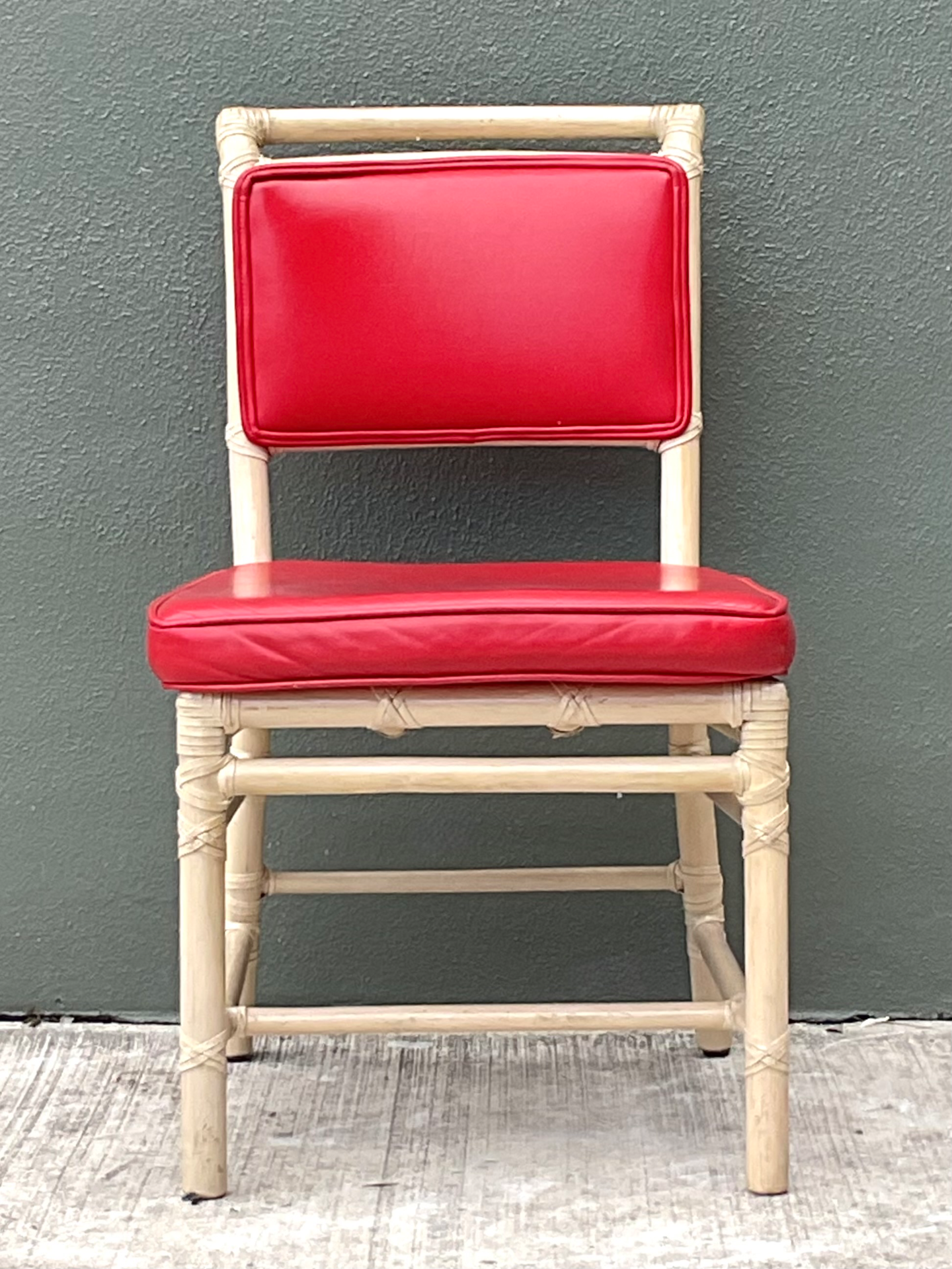 Vintage McGuire Red Upholstered Rattan Desk Chair - Detail view