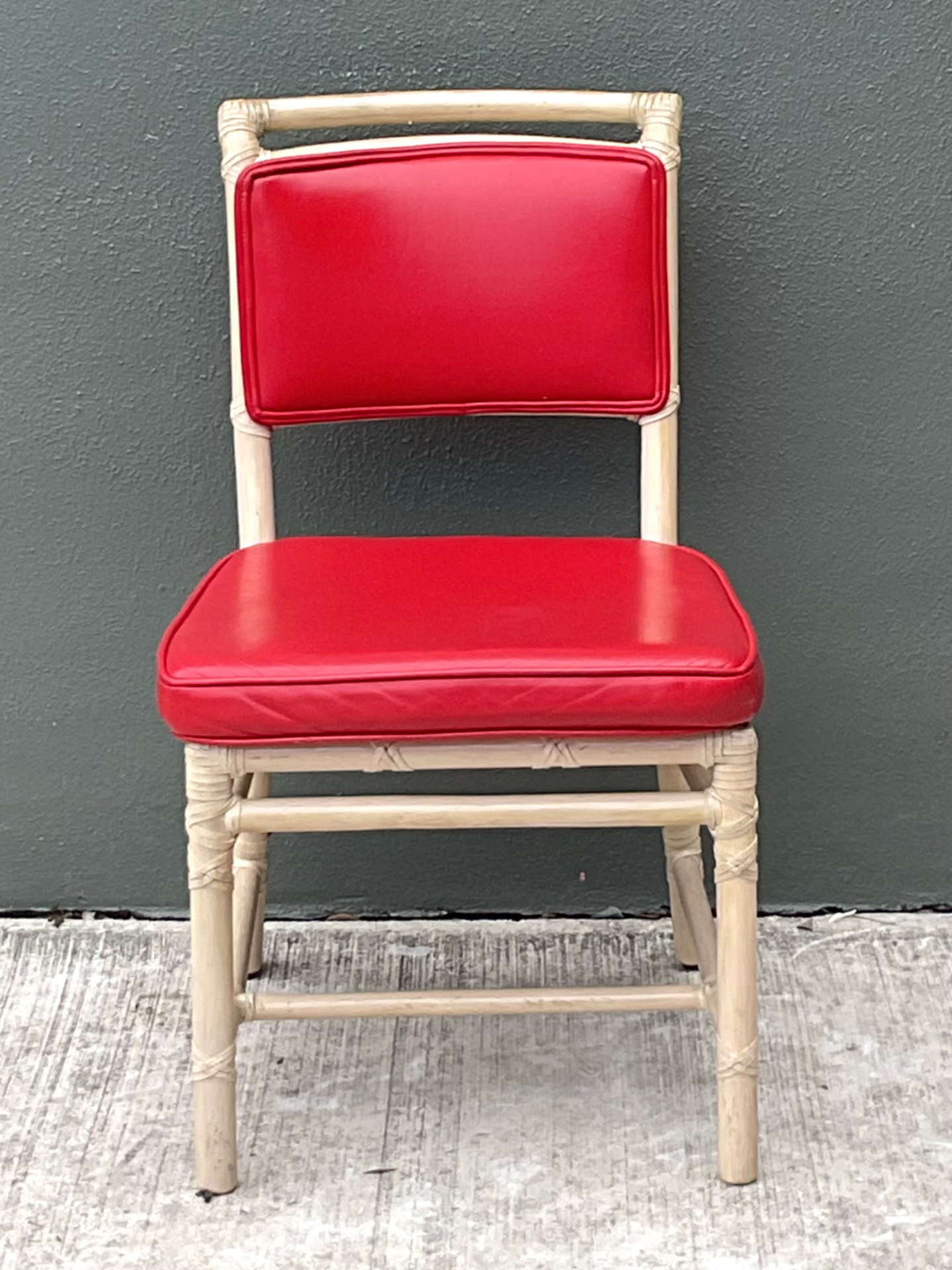 Vintage McGuire Red Upholstered Rattan Desk Chair - Side view