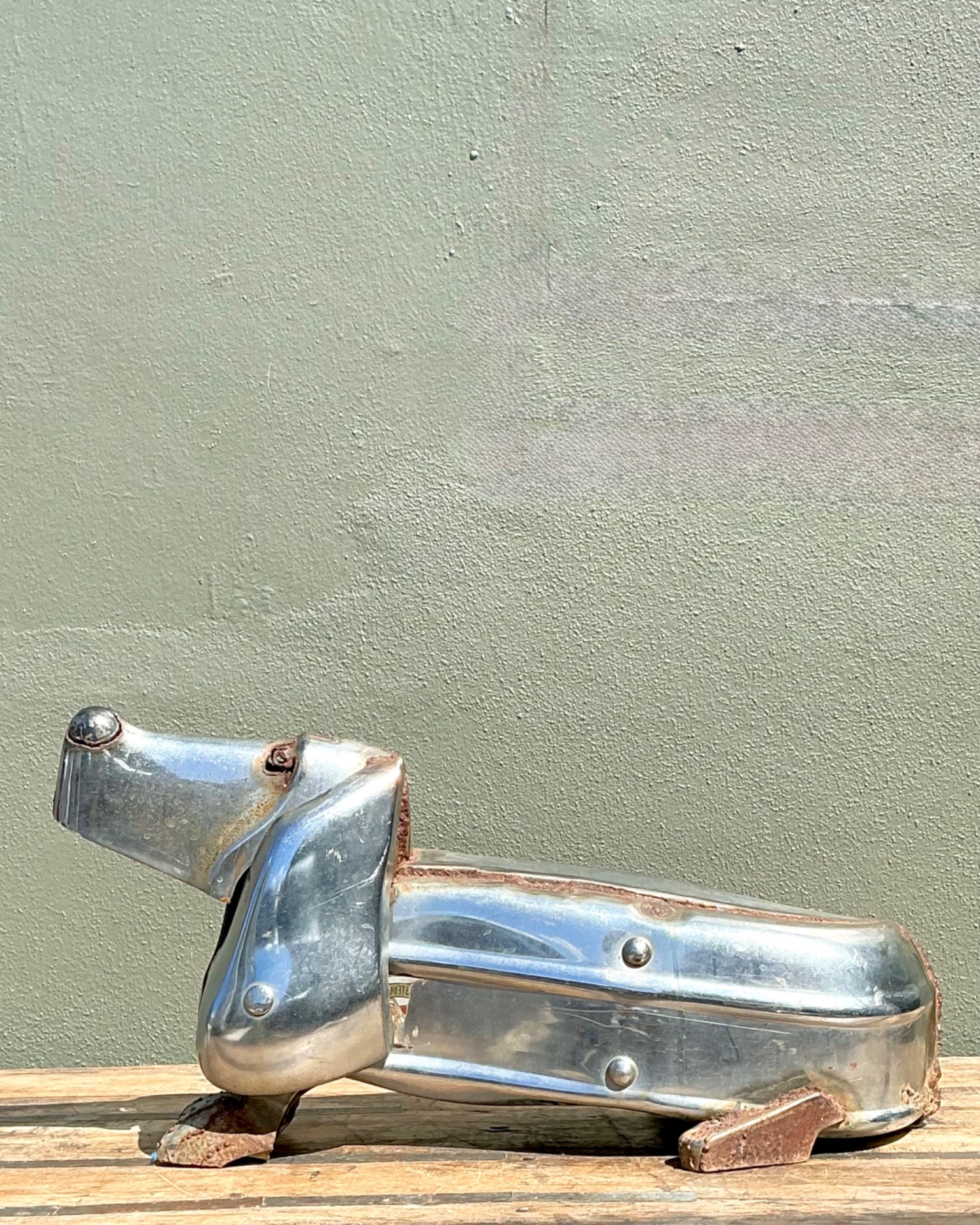 Vintage Chrome Bumper Abstract Dachshund Sculpture - Side view