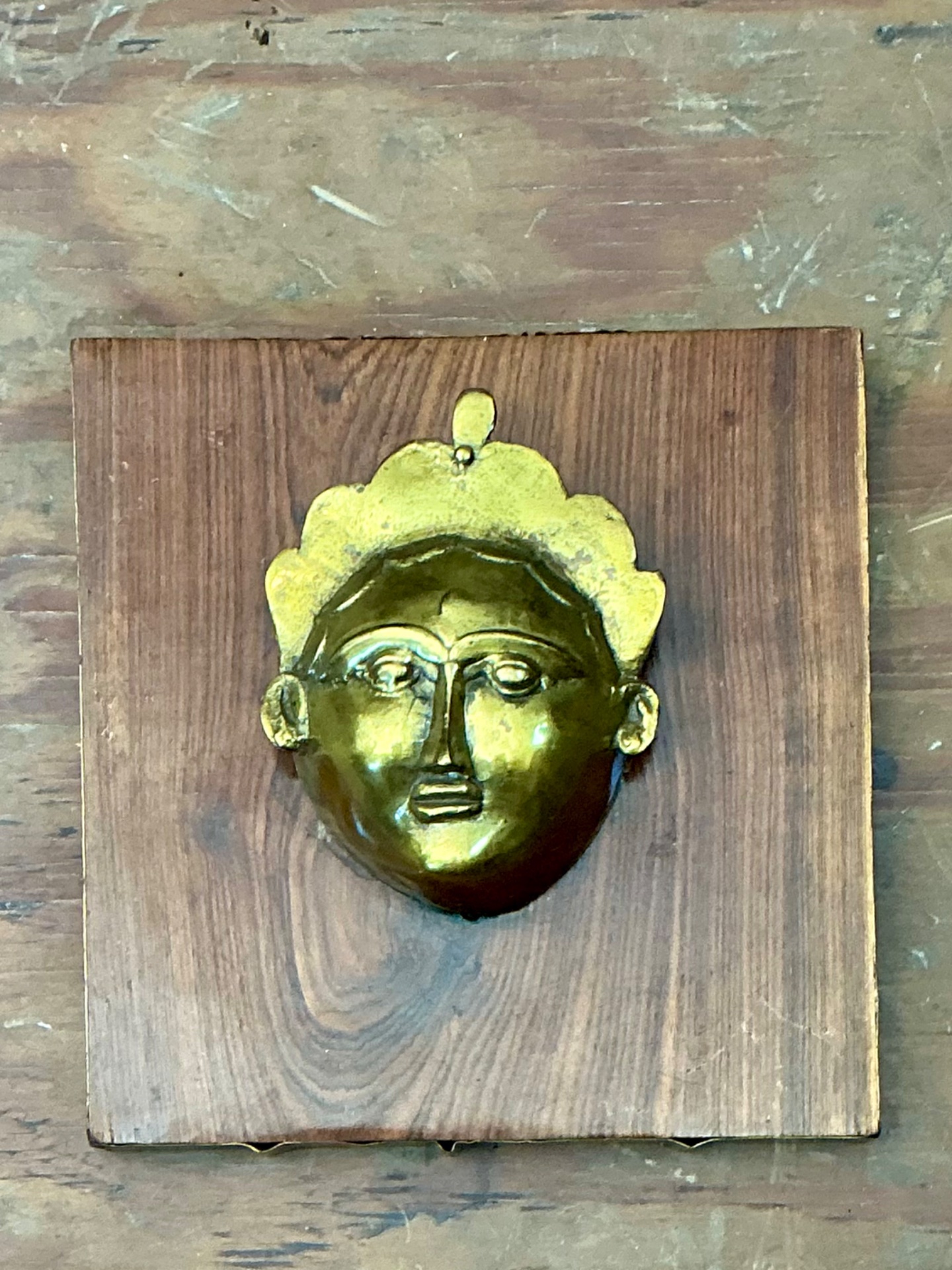 Vintage Brass Mask Mounted on Wood - Detail view