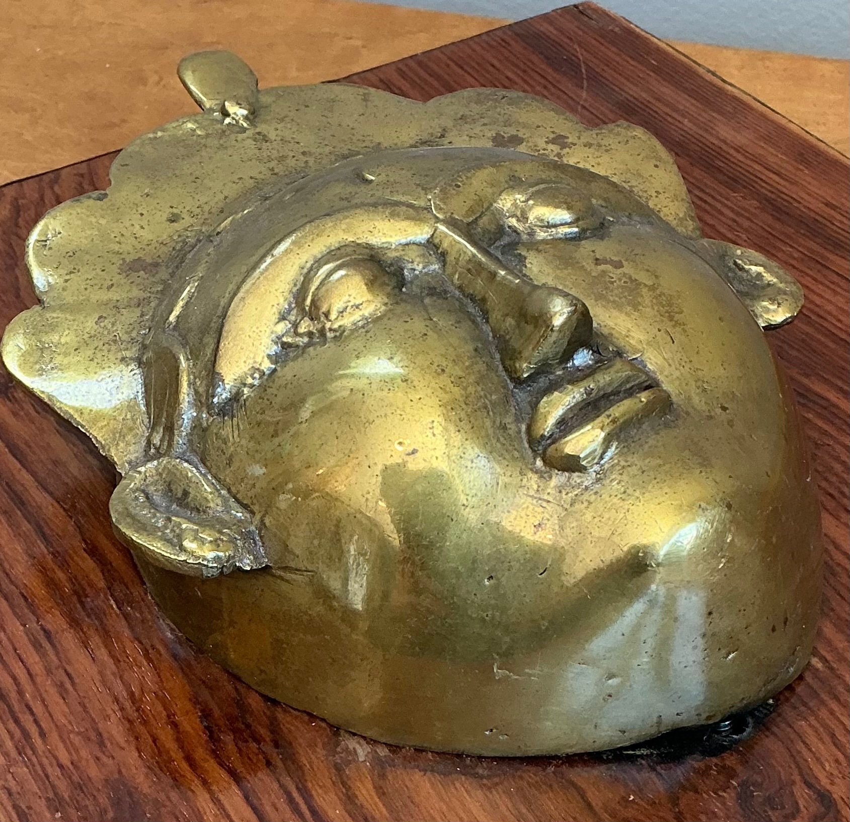 Vintage Brass Mask Mounted on Wood - Side view