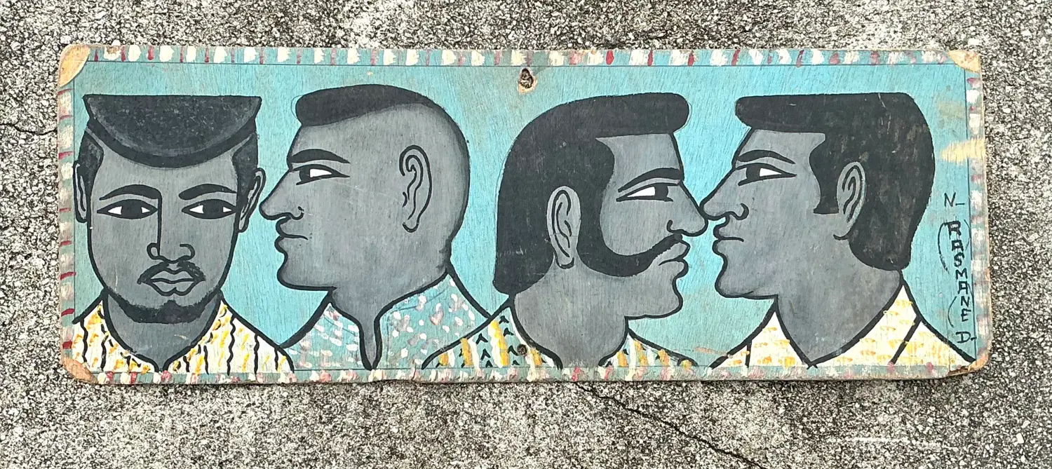 Vintage 70s Hand Painted Barber Hairstyle Sign - Side view