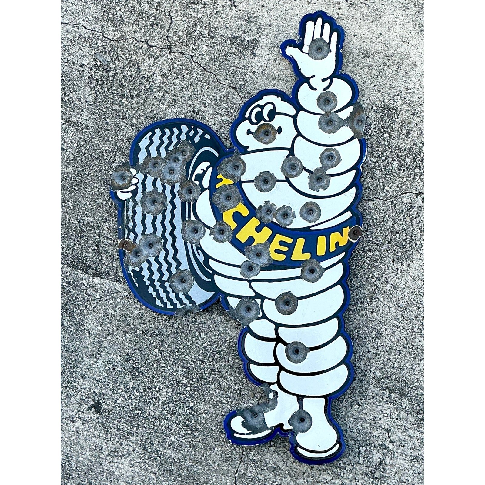 Vintage Bullet Anole Michelin Man Wall Sculpture - Detail view