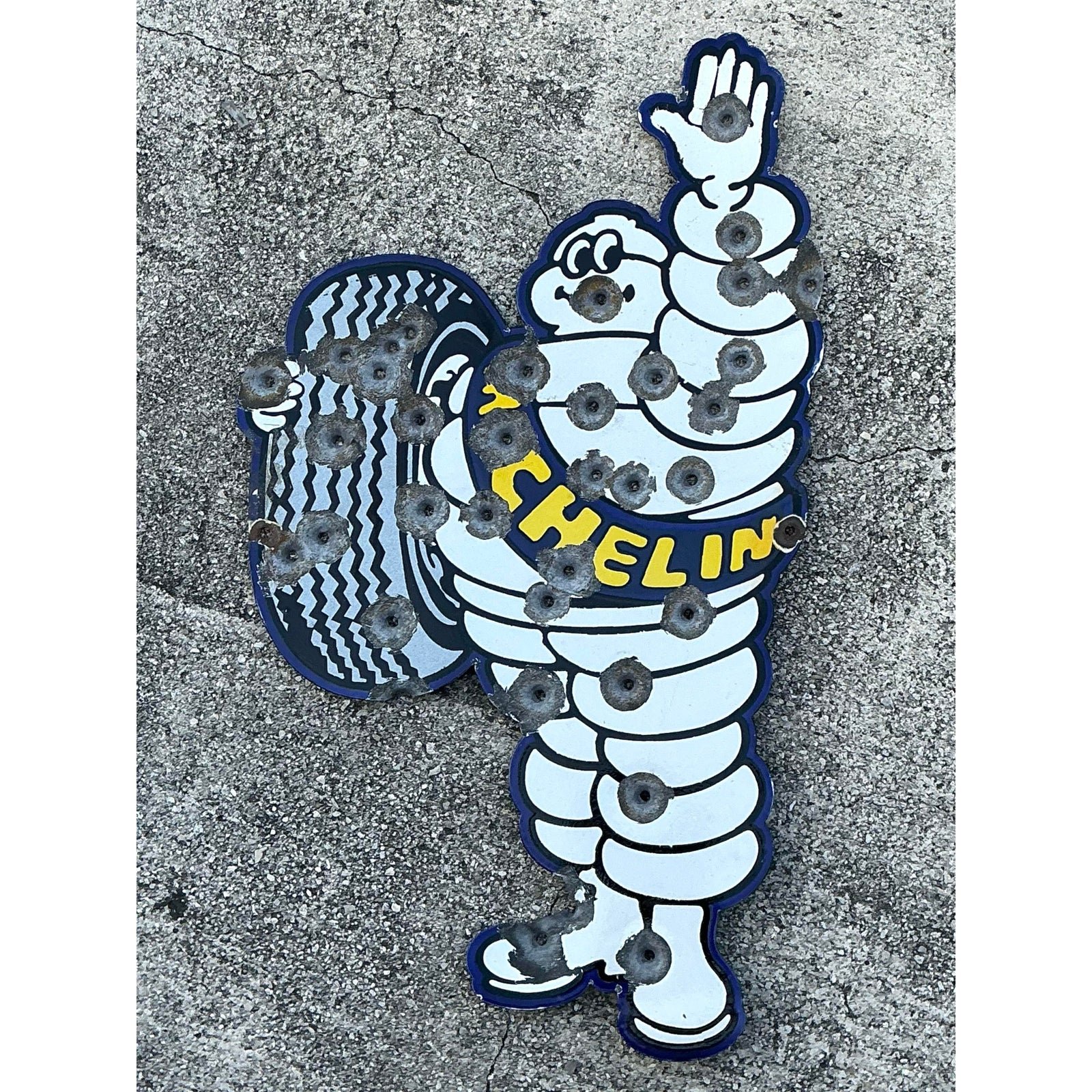 Vintage Bullet Anole Michelin Man Wall Sculpture - Side view