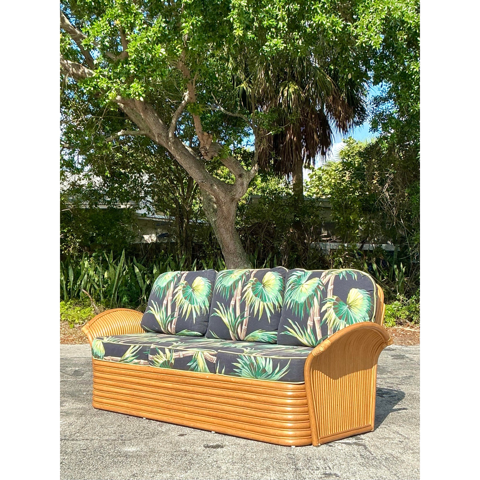 Vintage Coastal Palm Print Rattan Sofa - Side view