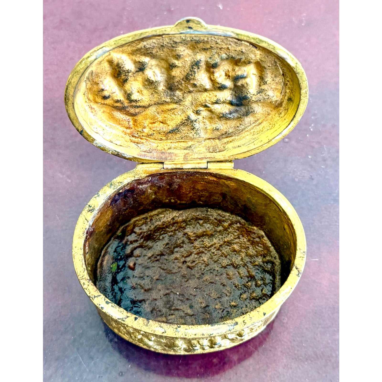 Vintage Embossed Metal Trinket Box With Festive Village Scene - Side view