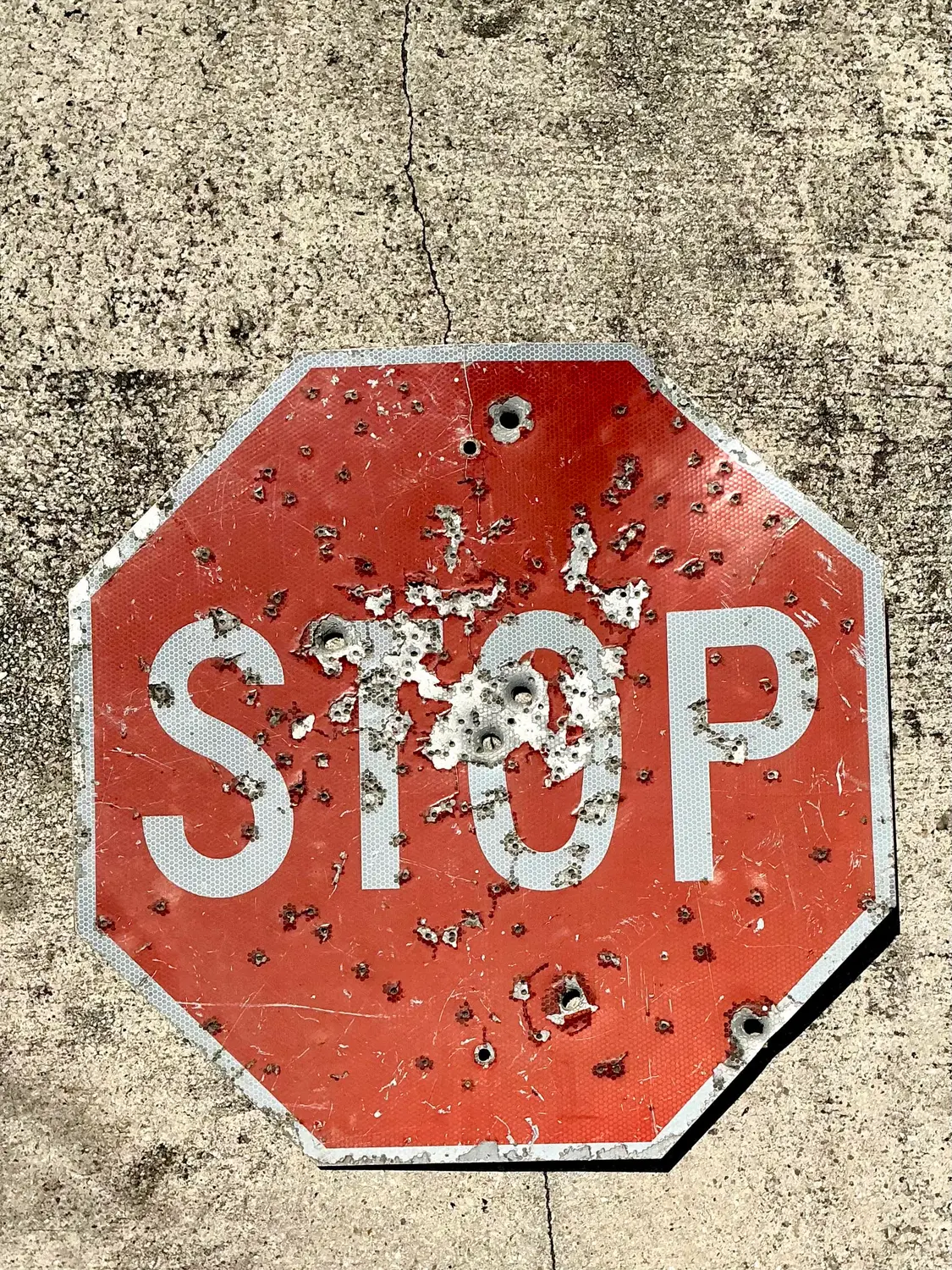 Vintage Gunshot Stop Sign - Detail view