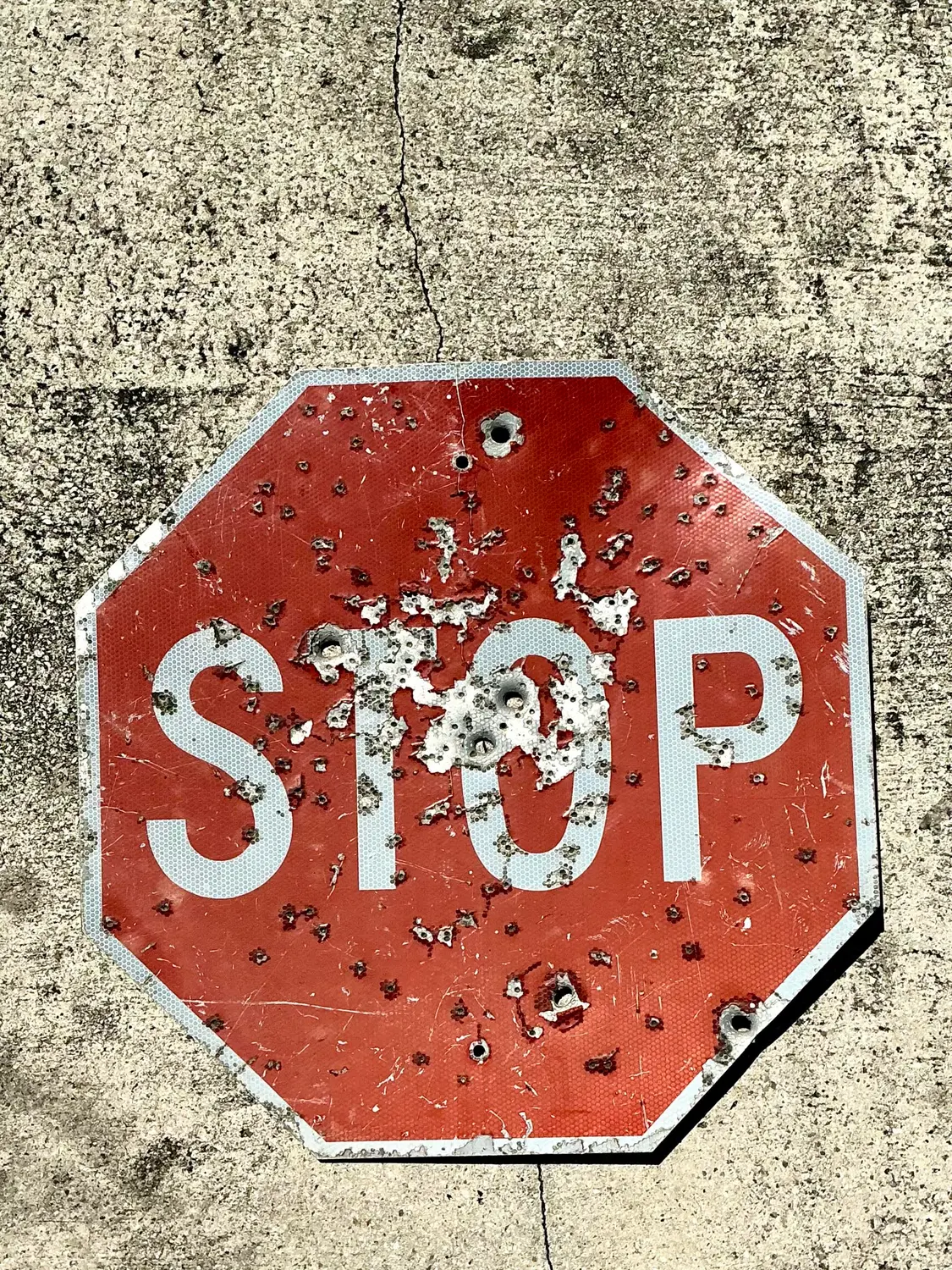 Vintage Gunshot Stop Sign - Side view